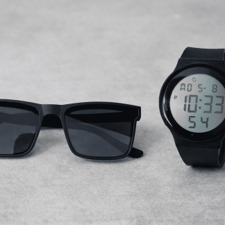 Watch and sunglass combined image